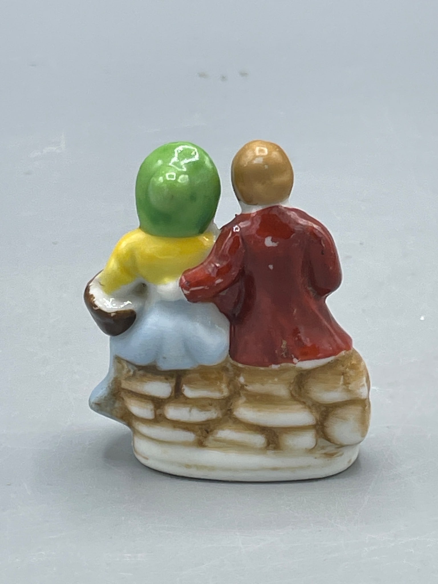 Porcelain Figural Couple Sitting On Stone Bench - 2