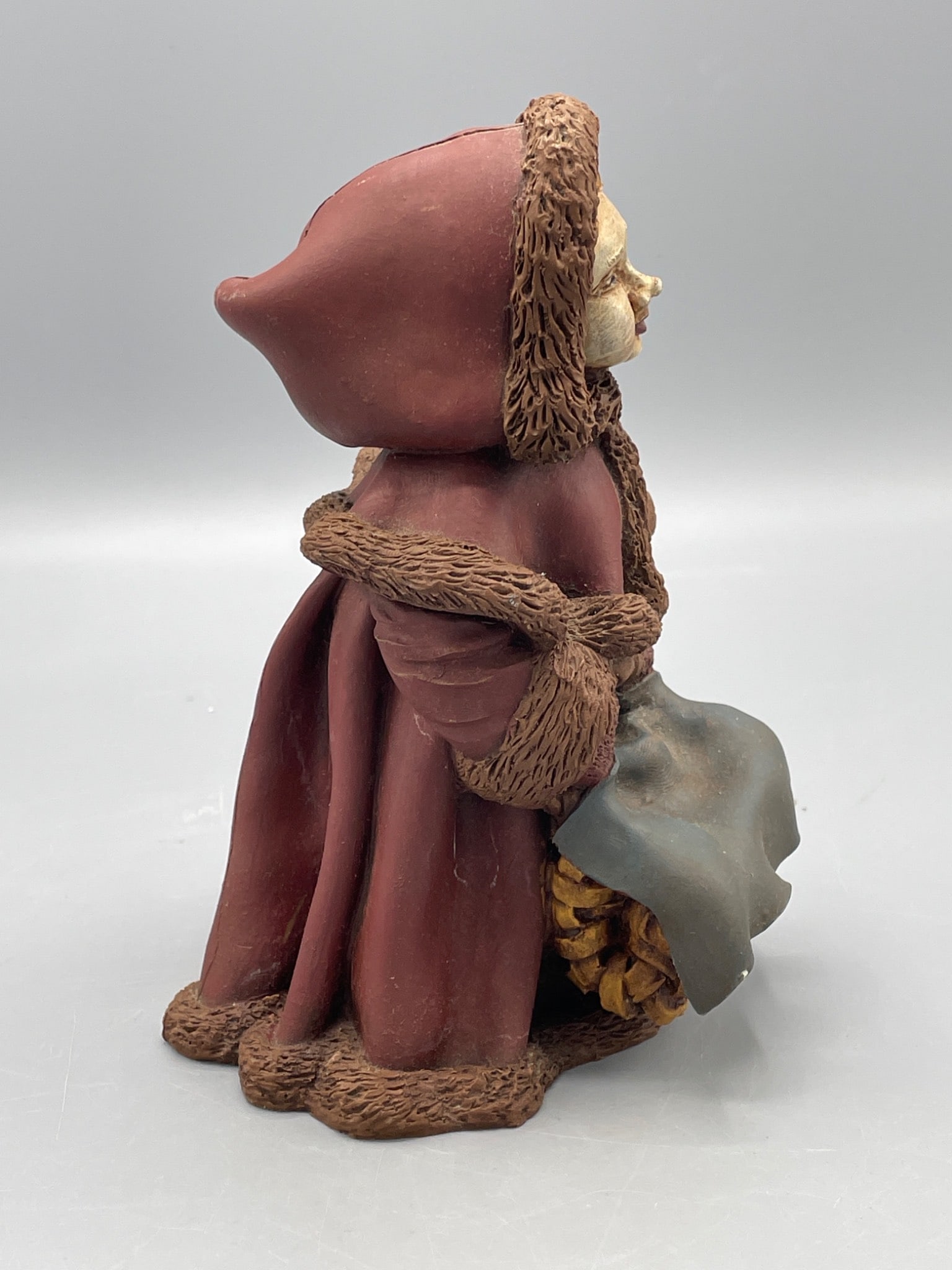 Handcrafted Clay Figurine Depicting Hooded Woman with Basket - 4