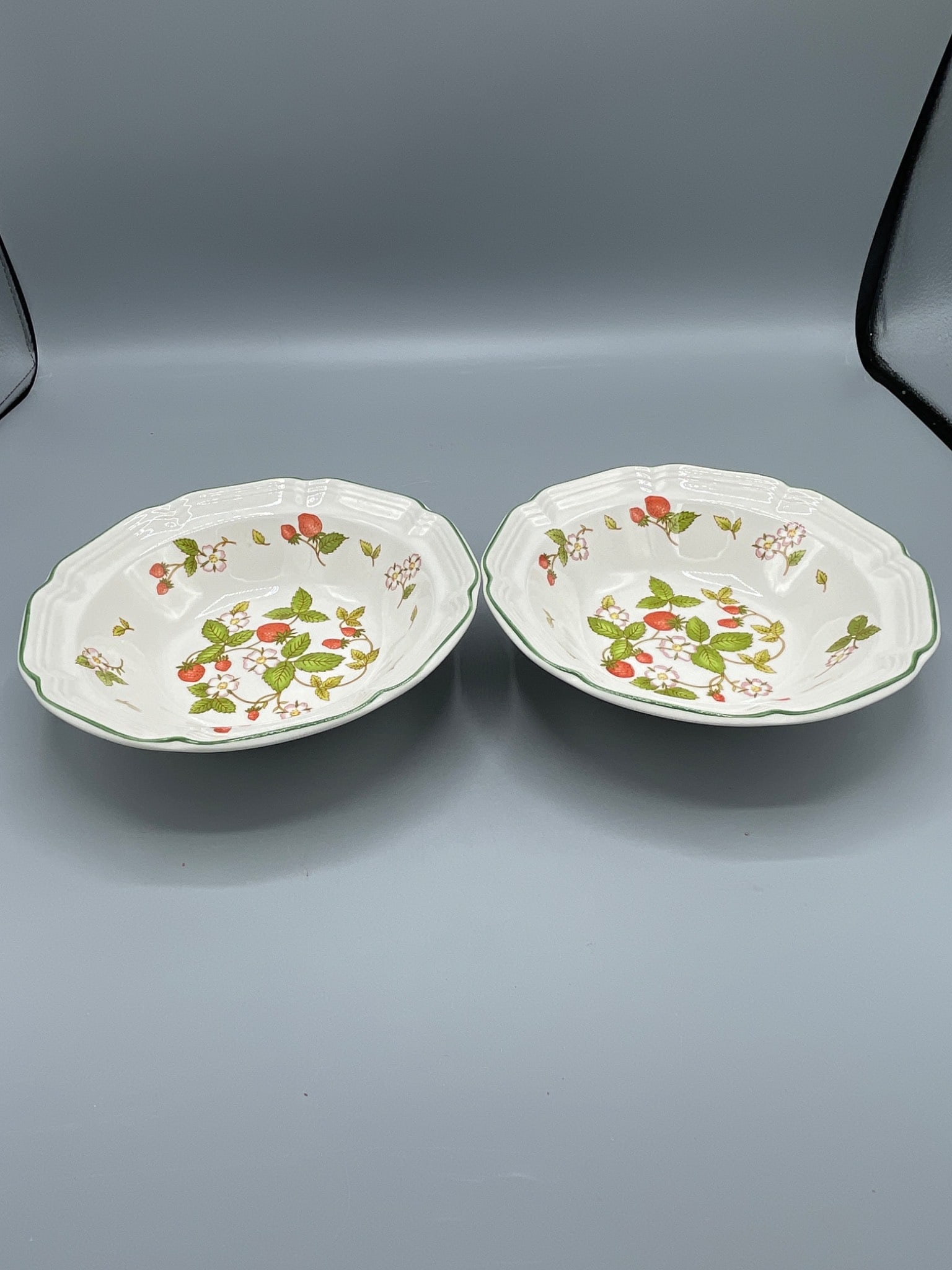 Hankook Fine China Strawberry Pattern Bowls Made in Korea: Hankook fine china bowls featuring a strawberry and floral pattern. Each bowl is marked 'Hankook Fine China Korea' on the bottom. The bowls measure approximately 7.5 inches in diameter and 2 inches