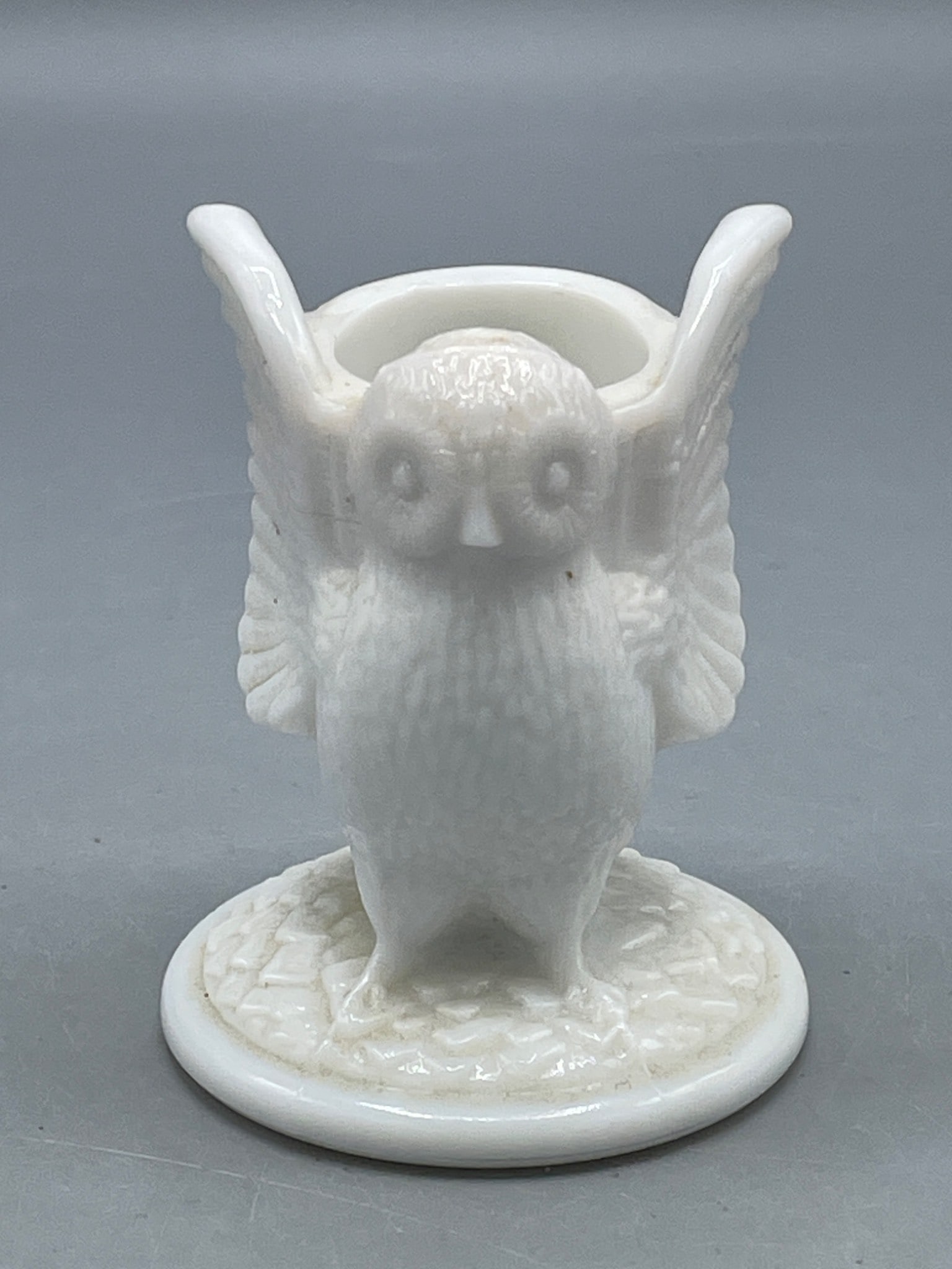 Westmoreland Glass Milk Glass Owl Figurine Toothpick Holder with Original Label: This is a Westmoreland Glass handmade milk glass owl-shaped toothpick holder featuring the original 'Authentic Westmoreland Milk Glass' sticker inside. The piece is crafted in white milk glass and