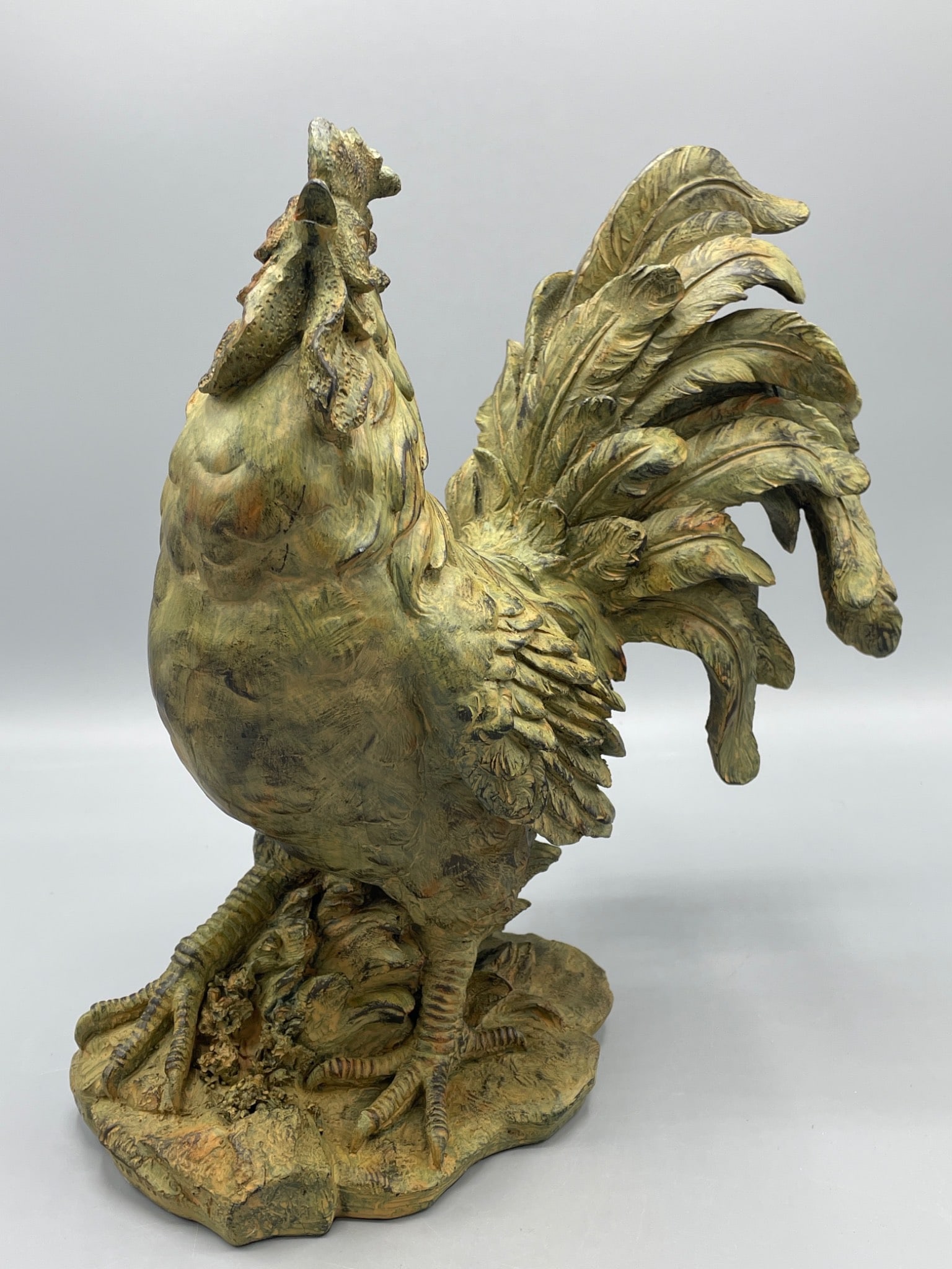 Ceramic Rooster Figurine by Expo, Approximately 12 Inches Tall: This is a ceramic rooster figurine marked 'Expo' on the base. The piece stands approximately 12 inches tall, with intricate detailing throughout. Made of ceramic, it features an earthy, painted