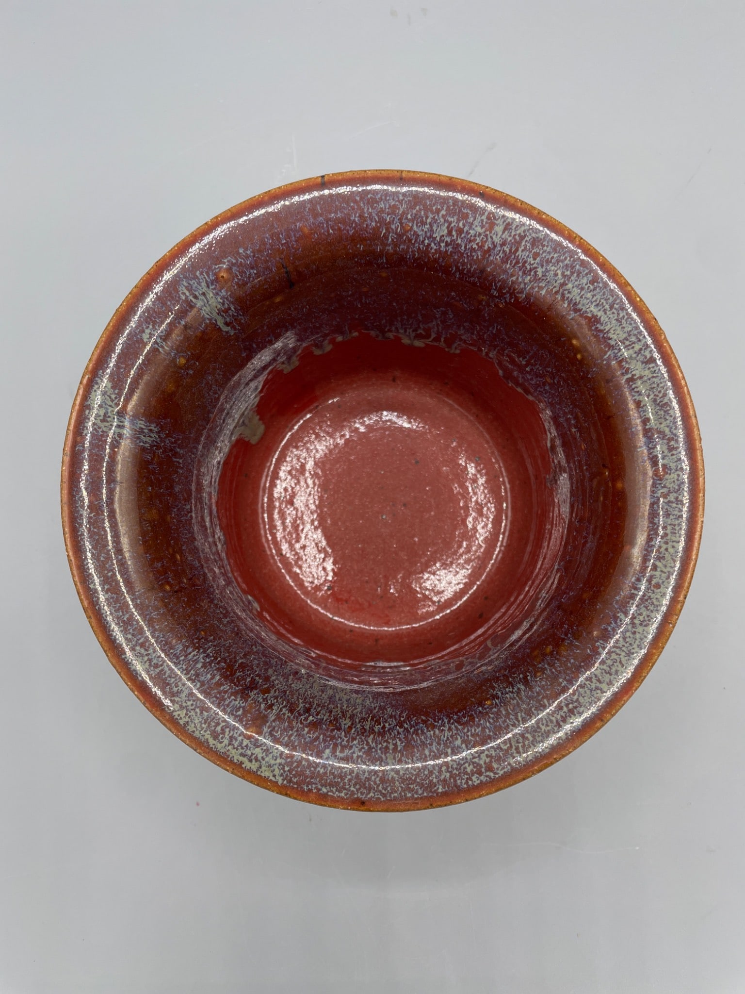Handcrafted Ceramic Bowl with Red and Blue Glaze - 3
