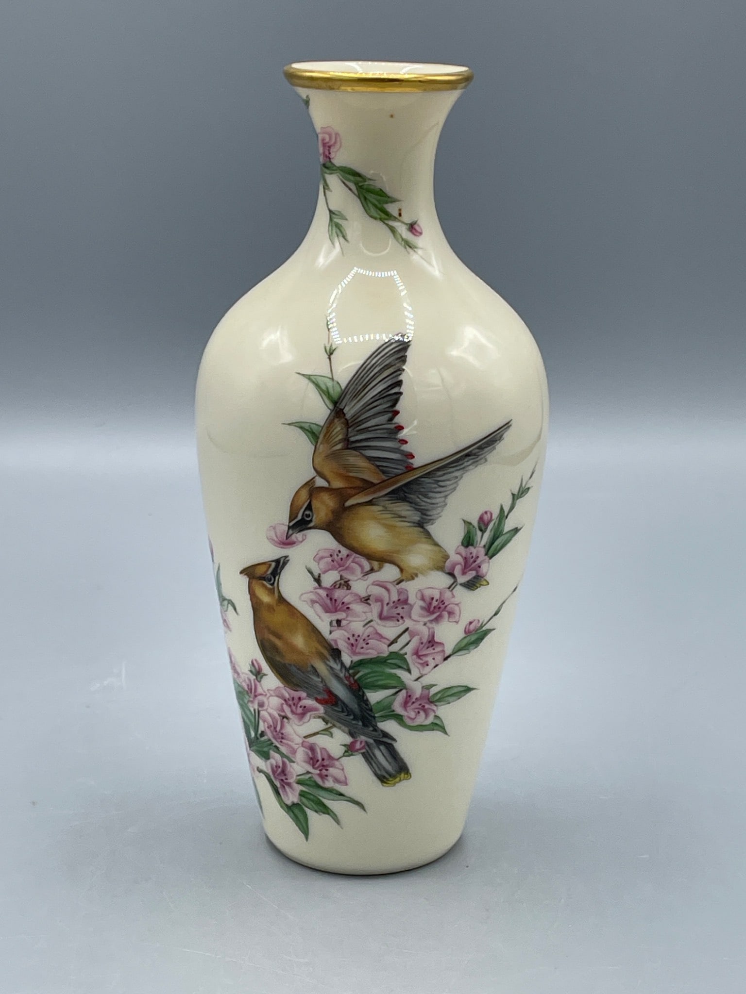 Lenox Gift Of Love Vase Made of Fine Ivory China With Bird And Floral Design: This Lenox Gift of Love vase is crafted from fine ivory china and is part of a limited edition series. It features a bird and floral design and measures approximately 7 inches in height. The bottom is