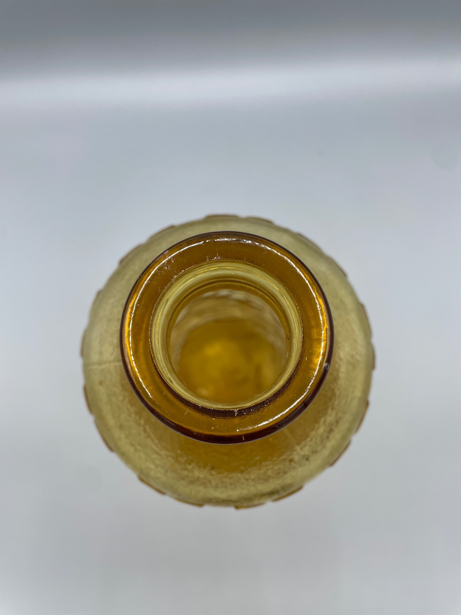 Amber-Colored Pressed Glass Bottle With Embossed Fruit Design - 3
