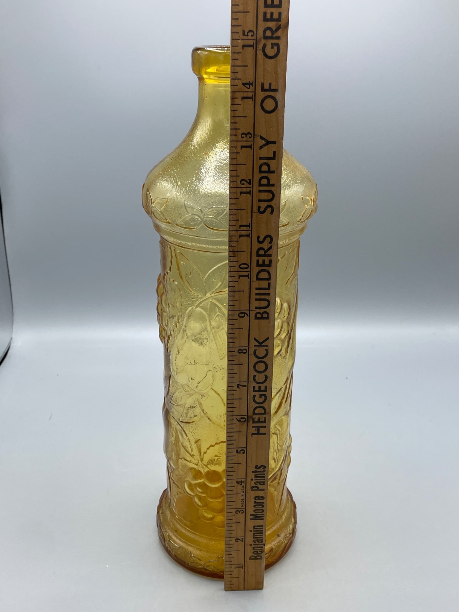 Amber-Colored Pressed Glass Bottle With Embossed Fruit Design - 5