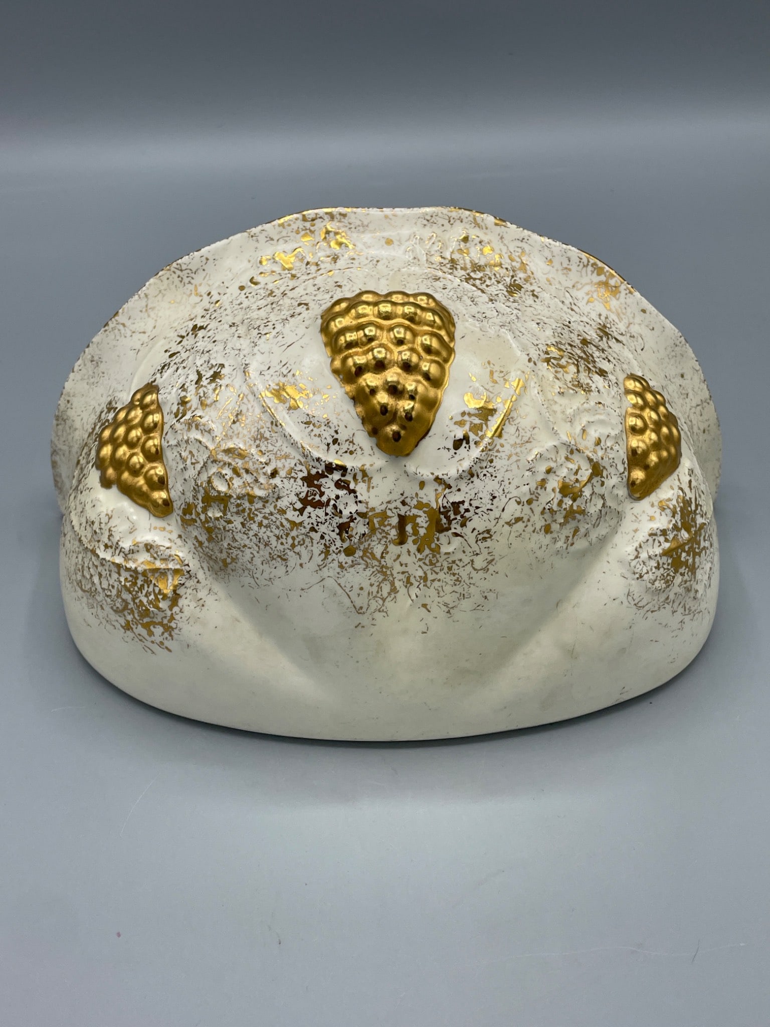 White And Gold Ceramic Wall Pocket Signed â€˜Eliza Baily 12-1-65â€™: Ceramic wall pocket featuring a white glaze with gold accents in the form of raised grape motifs. The back is inscribed with â€˜Eliza Baily 12-1-65.â€™ The piece has