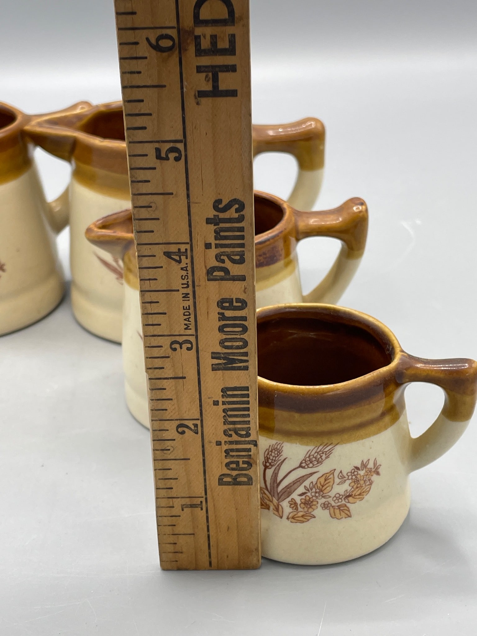 Four Ceramic Cream Pitchers with Wheat Motif - 7