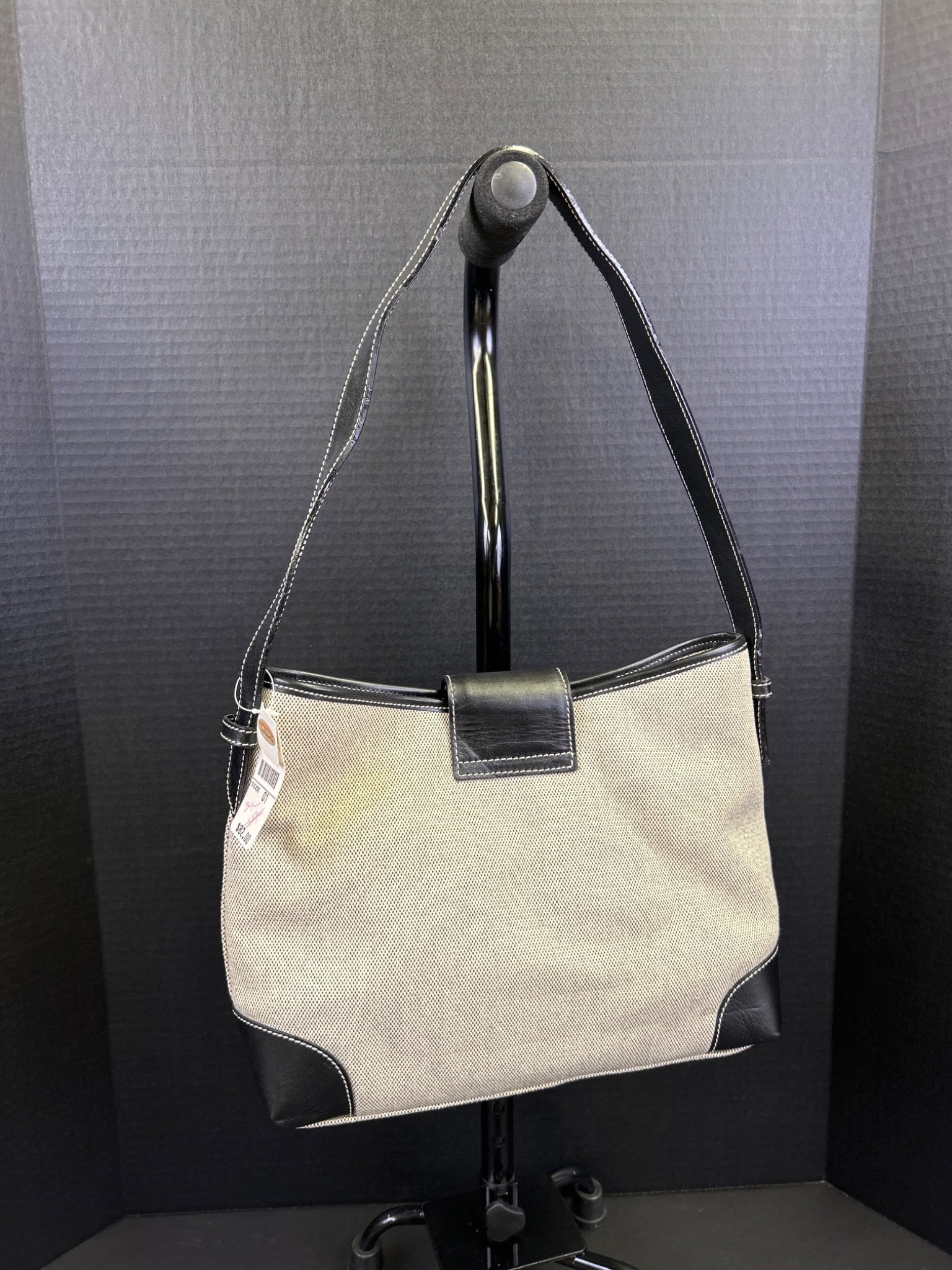 Telfran Genuine Leather and Fabric Shoulder Bag Made in Italy: Telfran shoulder bag featuring a combination of genuine black leather and patterned fabric. Label indicates 'Made in Italy'. Includes an interior zip pocket and a secure flap closure. U.S. Patent