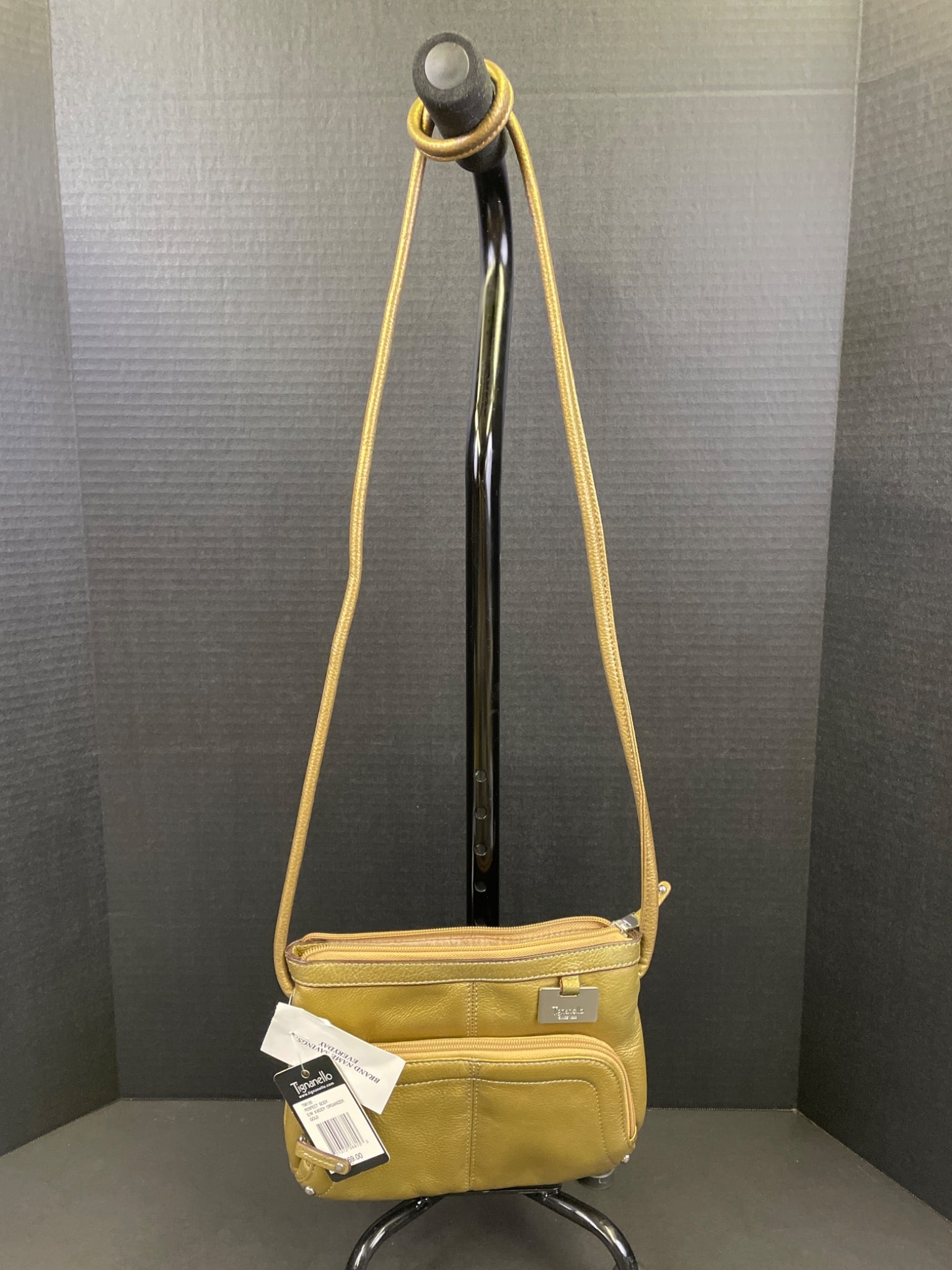 Tignanello Perfect Body E/W X-Body Organizer Gold Crossbody Bag: Tignanello crossbody bag in gold, model T98120, titled 'Perfect Body E/W X-Body Organizer.' Includes multiple compartments and organizer pockets with a zip-top closure. Item includes manufacturer