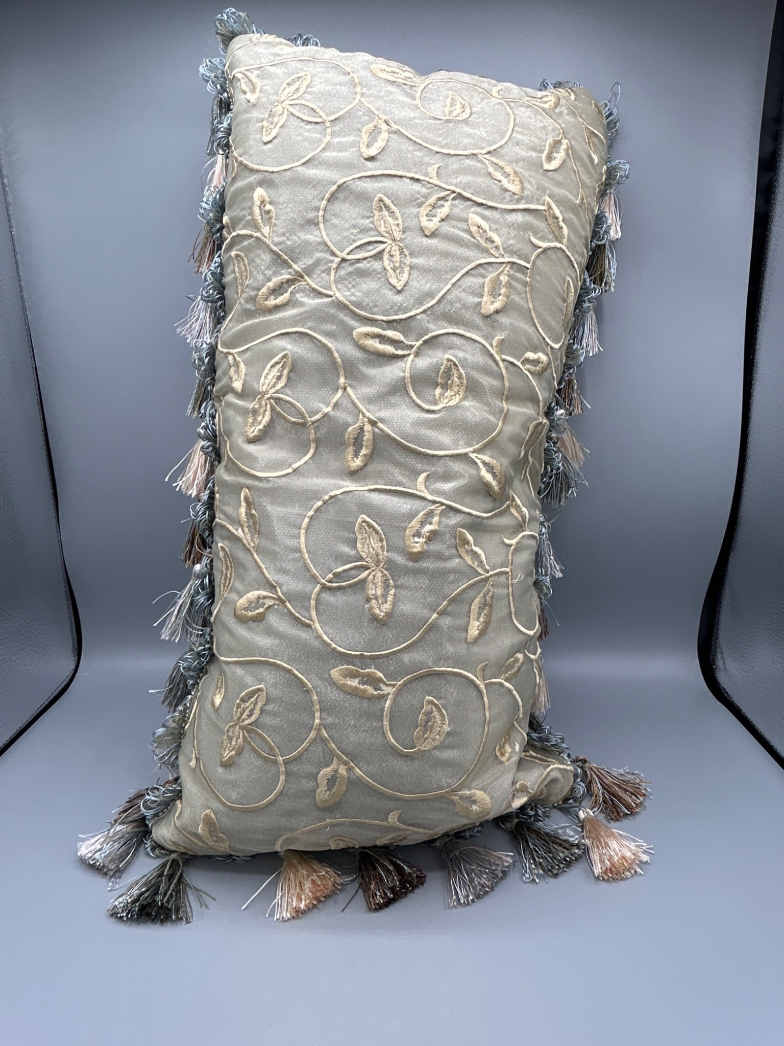 Chris Madden JC Penney 22-Inch Decorative Pillow with Embroidered Design: This is a 22-inch rectangular decorative pillow from the JC Penney Home Collection designed by Chris Madden. The fabric features a 100% nylon front with 100% rayon embroidery, and the back of the