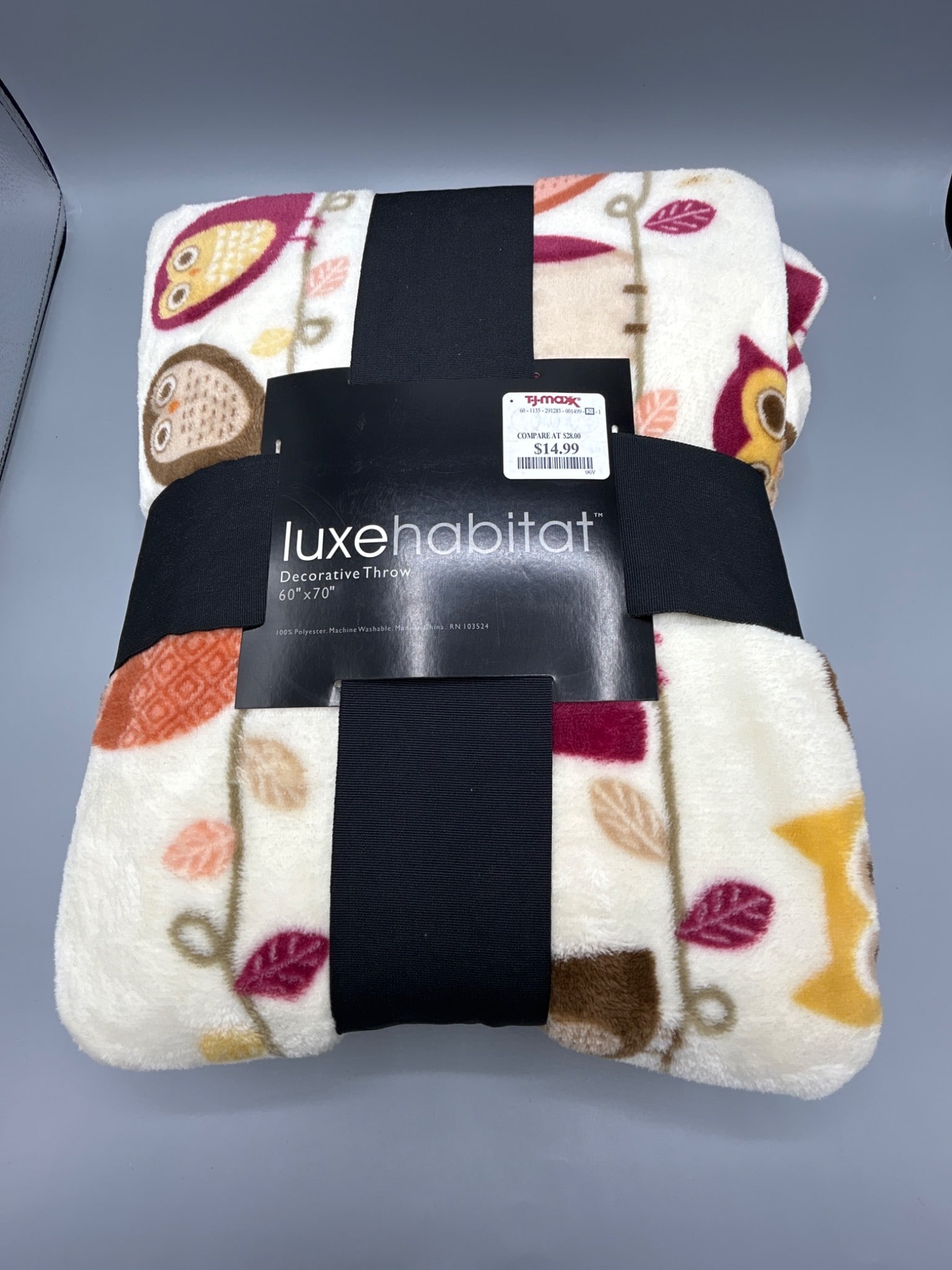 Luxe Habitat Decorative Throw, Owl Design, 60x70 in: Luxe Habitat decorative throw measuring 60x70 inches. This throw features an owl pattern and is made of 100 percent polyester. It is machine washable for easy care. Original retail sticker indicates