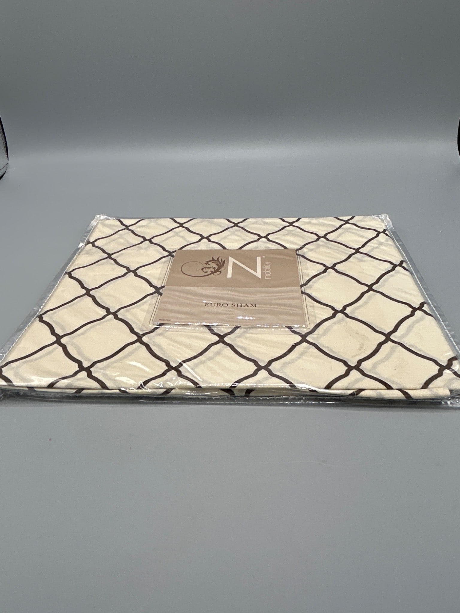 Nobility Nottingham Euro Sham, 26 x 26 in, 100% Cotton, Model 0773: This listing is for a Nobility Nottingham Euro Sham with product dimensions of 26 x 26 inches (66 cm x 66 cm). The shell is made from 100% cotton, ensuring quality and comfort. Identified by model
