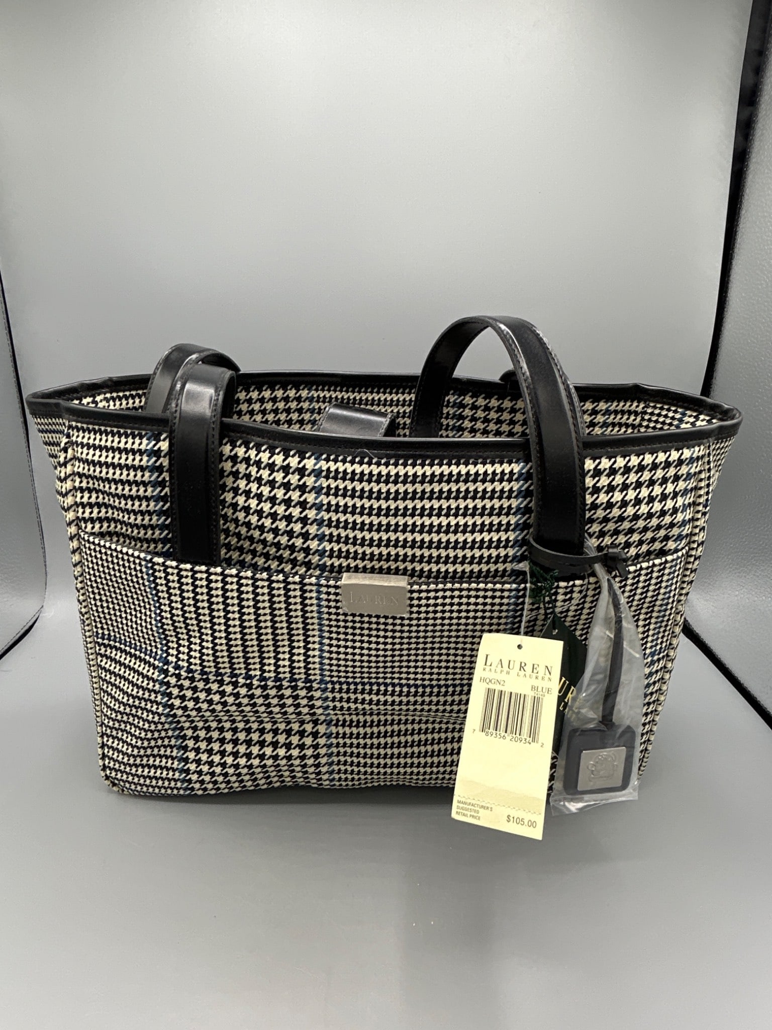 Lauren Ralph Lauren HOGN2 Blue Plaid Tote Bag - Brand New: This Lauren Ralph Lauren tote bag model HOGN2 features a blue plaid houndstooth pattern with leather handles and accents. It comes brand new with tags attached and has never been used. The