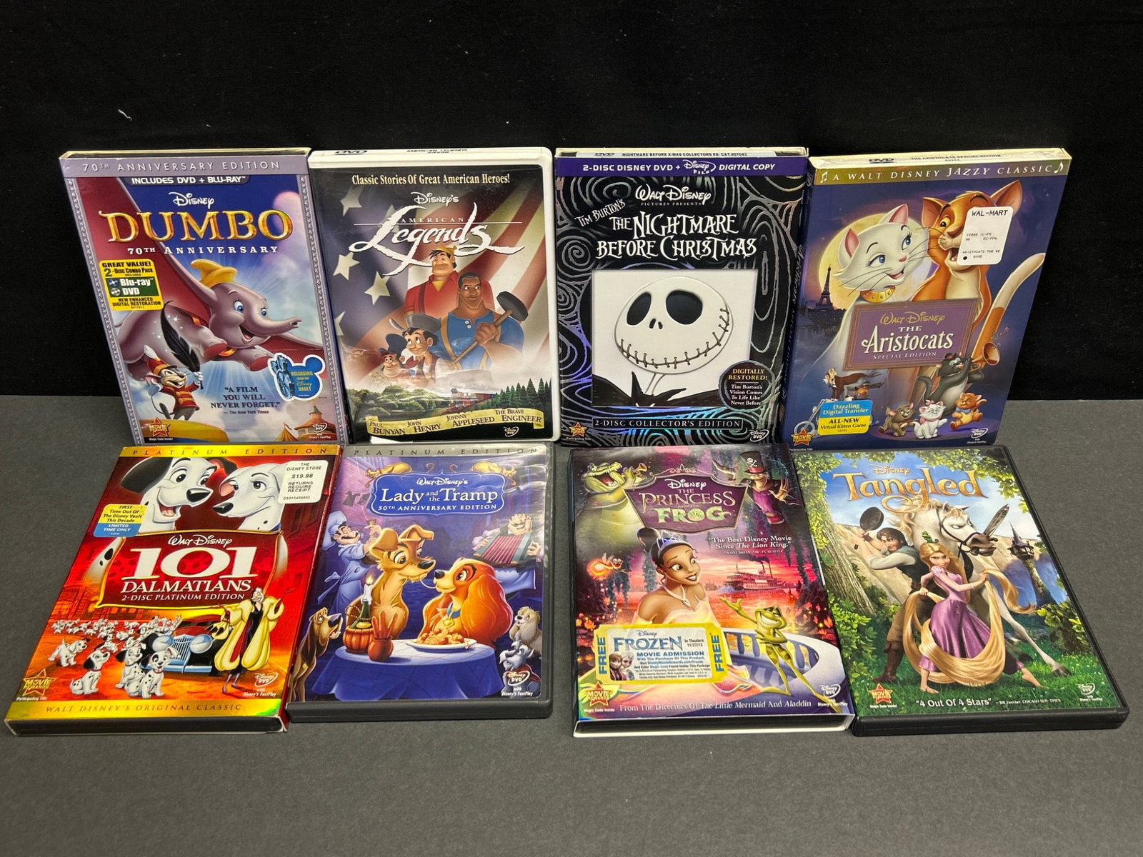 8 Used Disney DVD Titles, Various Releases: This lot includes 8 Disney DVDs: 'Dumbo' 70th Anniversary Edition, 'Legends' Disney For America, 'The Nightmare Before Christmas', 'The Aristocats', '101 Dalmatians', 'Lady and the Tramp', 'The