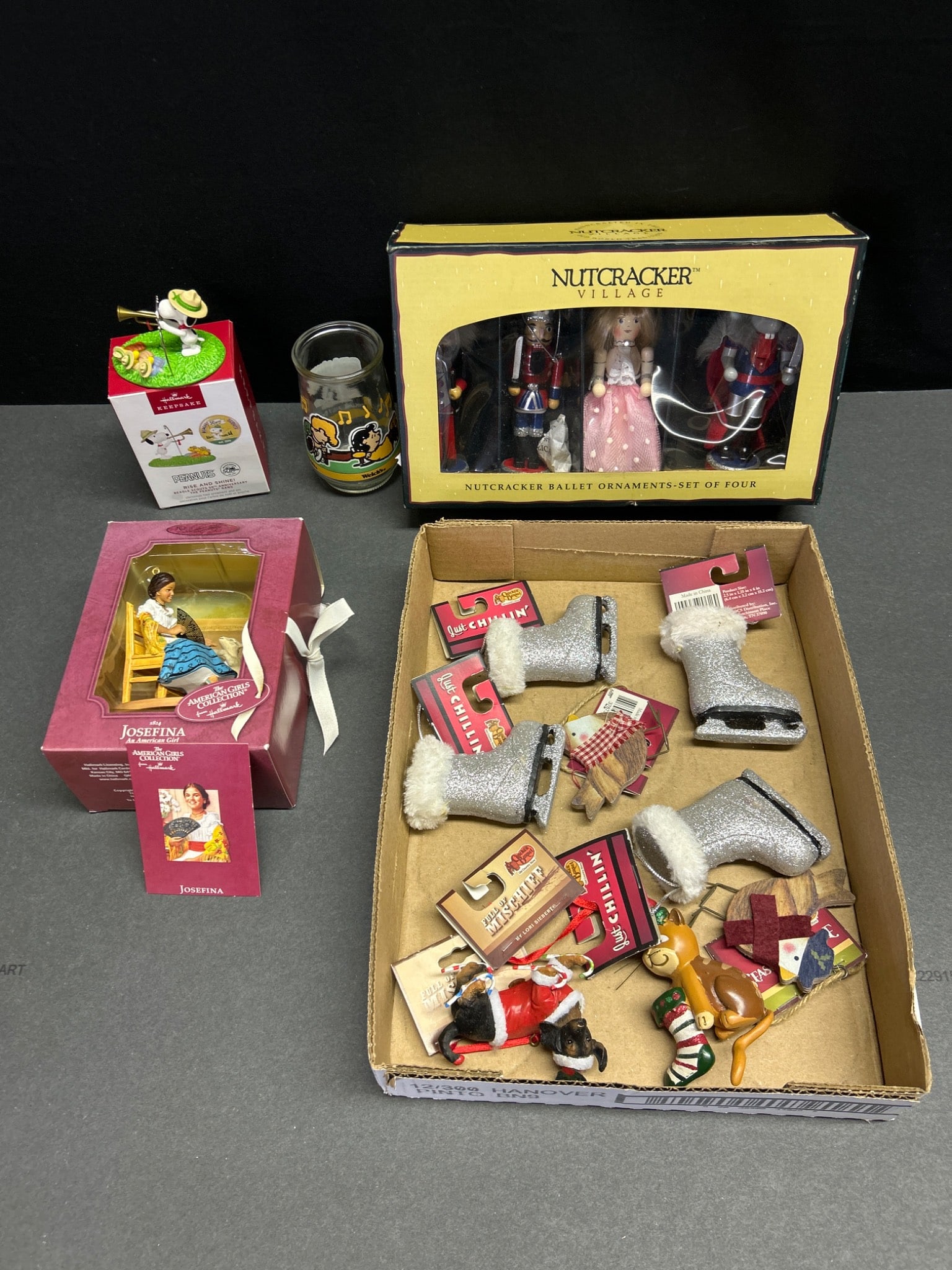 Collectibles Lot Featuring Nutcracker Ornaments and Peanuts Items (1 of 7)