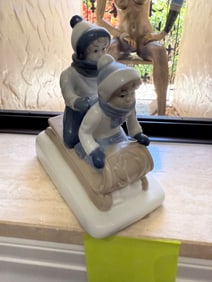 2 Kids on a sled
