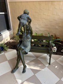 Bronze Sculpture Lady on a bench with child
