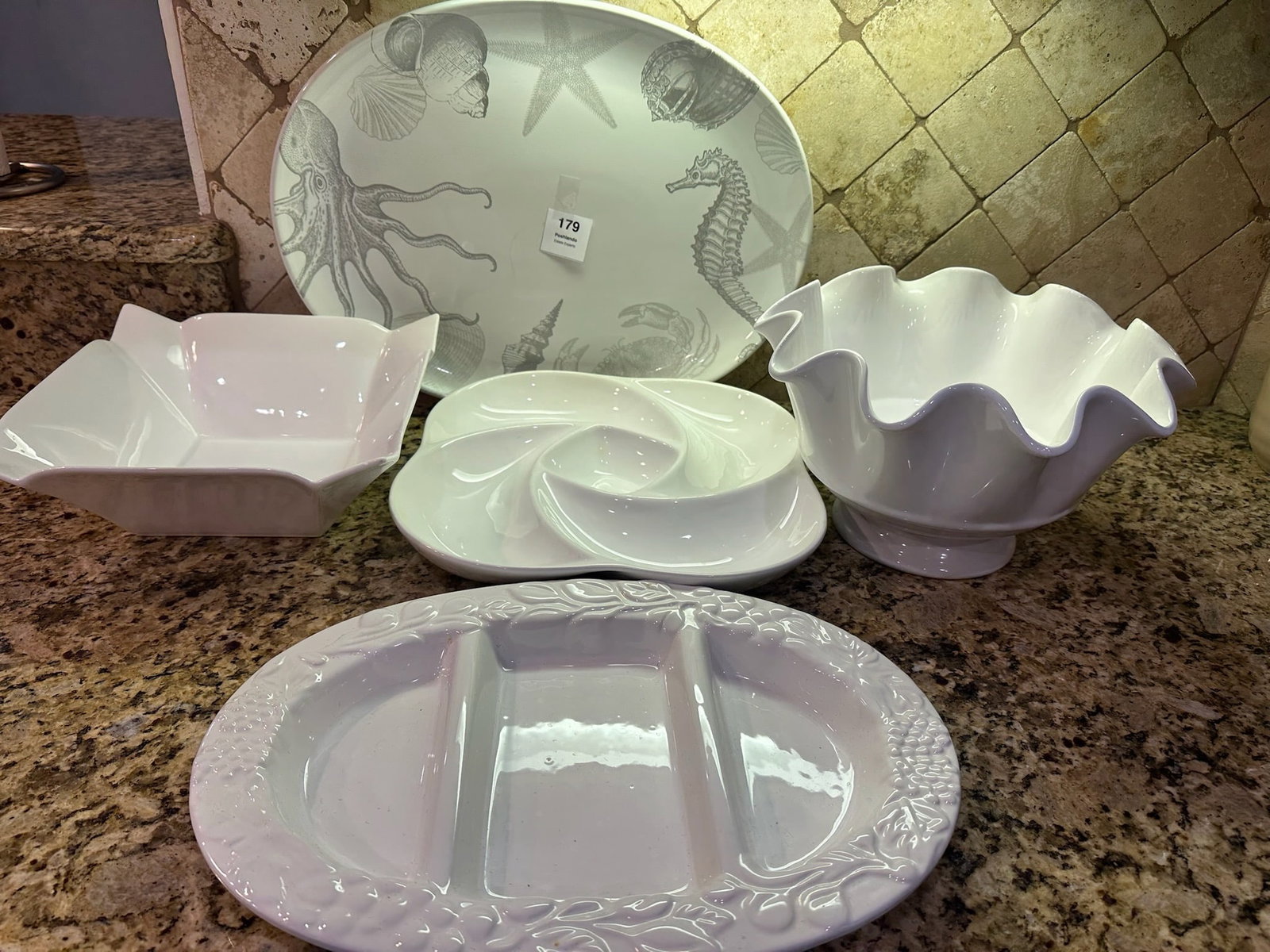 Assorted White Ceramic & Porcelain Serveware 222 Fifth, Chef-ology, HC: Grouping of white ceramic and porcelain serving pieces including: large oval platter with coastal life sea creature motif by 222 Fifth PTS International, divided rectangular tray marked Chef-ology, ru