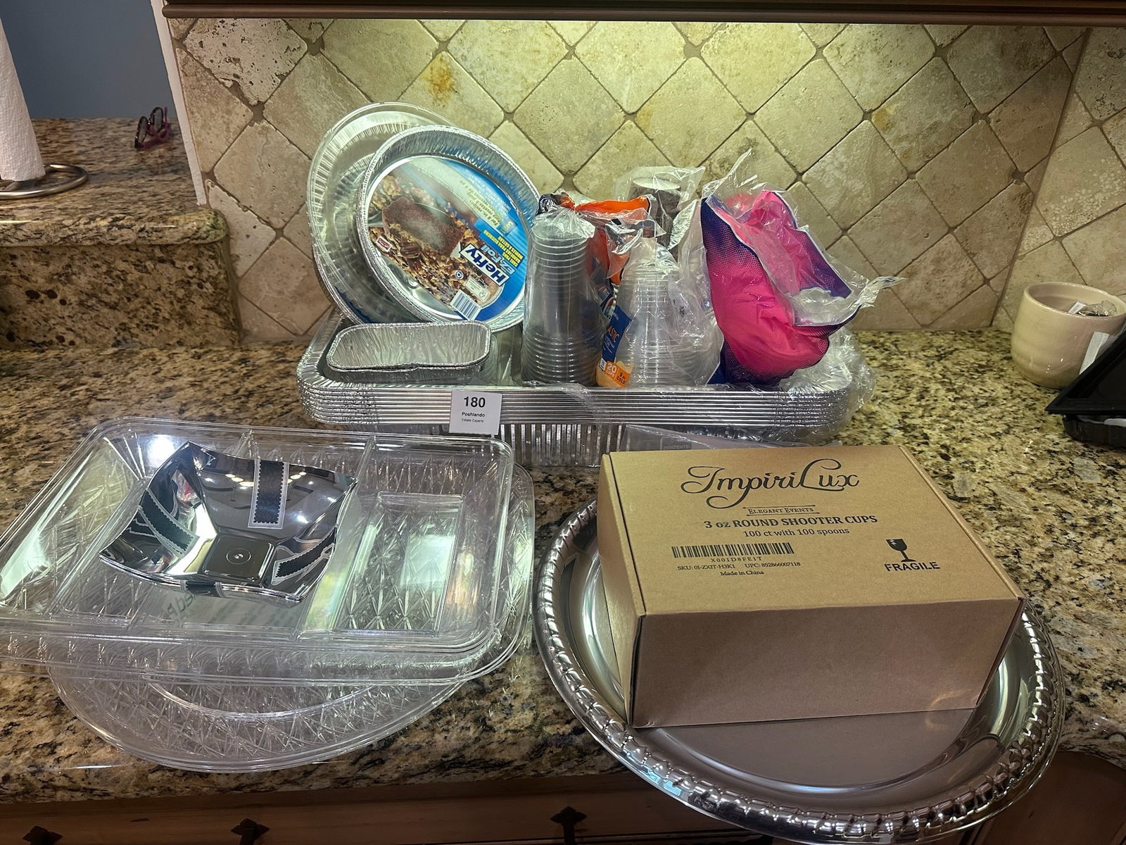 Disposable Partyware & Catering Lot Foil Pans, Plastic Serveware & Cups: Large grouping of assorted disposable and reusable partyware including foil roasting and baking pans (Hefty and others), plastic serving trays and platters, box of ImpiriLux 3 oz round shooter cups (1