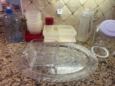Kitchen Storage & Pitchers Lot – Plastic Containers, Water Jug, Clear Platter & Bowls