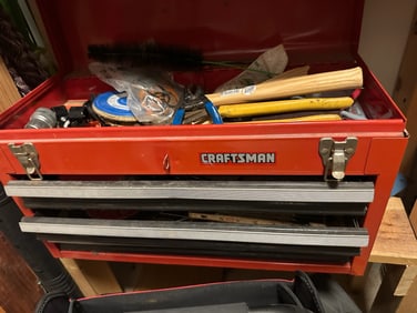 Craftsman red metal 2-drawer tool chest with assorted hand tools (hammers, pliers, files, and more)