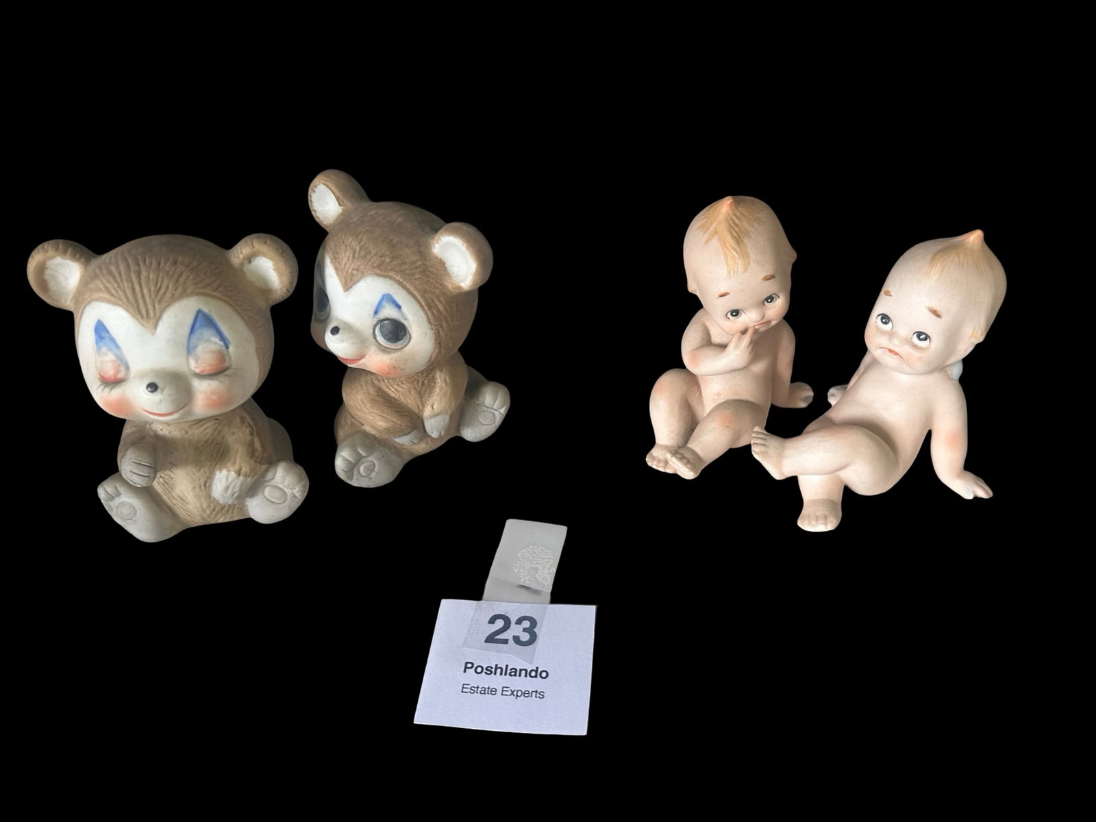 Lefton Bear Cubs & Bisque Kewpie Figurines: Pair of Lefton Exclusives bear cub figurines (marked with red foil label, “Lefton Trade Mark Exclusives Taiwan”), each with hand-painted clown-style faces and soft pastel accents. Together wit