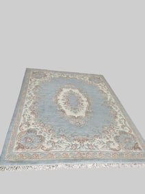 8 x 10 Hand-Tufted Wool Area Rug with Floral Motif and Fringed Edges
