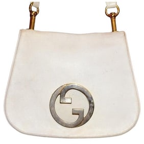 Vintage 1970s Gucci white textured leather Blondie style saddle bag with XL gold GG logo cutout in
