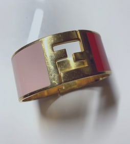 Fendi, substantial, enamel and gold clamper style bangle bracelet in pink & red with a large, 1"