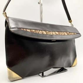 RARE, vintage, Dior, brown leather two-wy clutch/shoulder bag with a brown trotter print interior