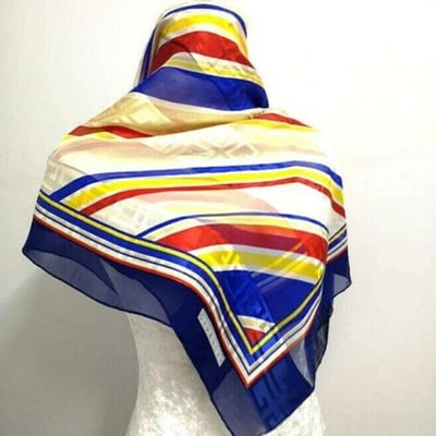 Givenchy Blue Red Gold Stripe Print Abstract Silk Scarf: For sale is a RARE, Givenchy, blue, red, white, and yellow striped print, 35" square, 100% silk scarf with a jacquard print of the Givenchy logo throughout and rolled stitching along the edges! This I