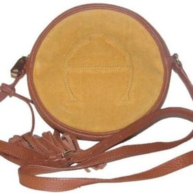 Etienne Aigner, 1970's- 1980's, yellow canvas and brown leather round canteen style cross body or