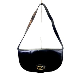Vintage, rare, black leather, Gucci shoulder bag with a large, two-tone 'GG' emblem and removable