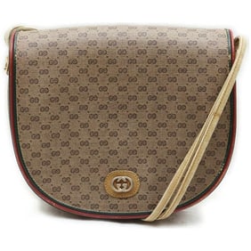 Gucci, rare, brown micro Guccissima print coated canvas/leather saddle bag with red and green inlaid