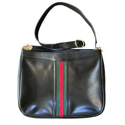 Gucci black leather hobo bag w Sherry stripe & horse-bit chain strap: For sale is a vintage, RARE, Gucci, mod, black leather, single strap, hobo style shoulder purse with a wide red & green center stripe, bold, gold, horse-bit, accents attaching the straps, & an