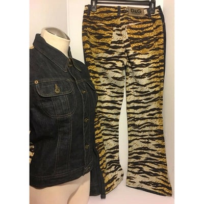 Dolce & Gabbana dark rinse denim & leopard print JEANS: For sale is a pair of Dolce & Gabbana dark rinse denim & leopard print JEANS in a size small, 38, 4. This piece is very lightly used- it has a whole life to live with you! It will mix and matc