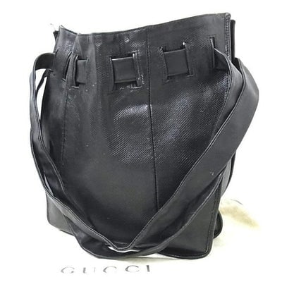 Gucci vintage Tom Ford black snakeskin leather drawstring top bucket bag: For sale is a vintage, Tom Ford era, AMAZING, classic, Gucci, snakeskin textured, black leather, big, drawstring top, rectangular, shoulder bag with an expandable bottom! A perfect, black, everyday pu