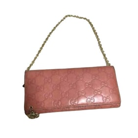 Gucci, salmon colored embossed Guccissima print leather, XL size, wallet on a removable chain