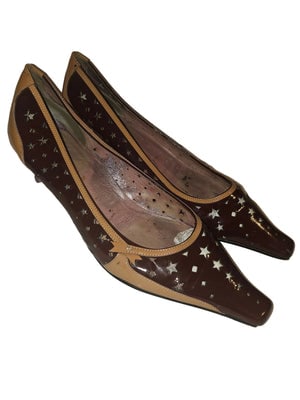 Prada color block kitten heels with cut outs: For sale is a stunning pair of Prada kitten heels in size 36.5 (US 6.5), crafted from patent leather in a rich burgundy, lilac, & camel color, These fun, low heel pumps feature a sleek pointy toe