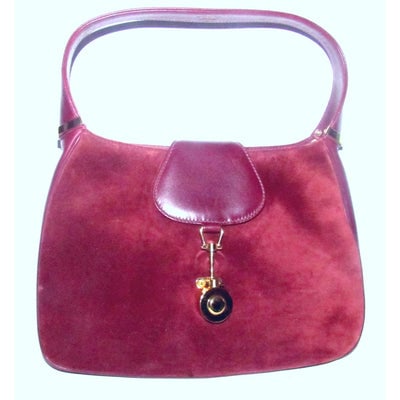 Rare, vintage, Gucci, burgundy leather & suede, unique, 1961 Jackie, hobo style shoulder bag with a: ** Gucci has recently re-released this style! ** For sale is a rare, vintage, Gucci, glossy burgundy leather and suede, unique, 1961 Jackie- O style, hobo style shoulder bag with a two-tone piston clo
