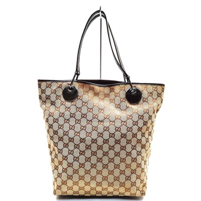 Gucci brown Guccissima print Tom Ford era Eclipse tote: For sale is a Gucci brown Guccissima print on beige canvas & leather Tom Ford era Eclipse tote with chrome hardware, a footed bottom, two flat leather straps, and a timeless style! Dimensions: 9.5