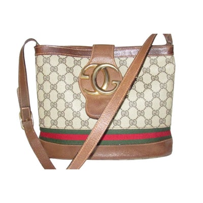 RARE, Gucci, brown Guccissima print canvas & leather, bucket bag with an XL bold gold 'GG' & red & (1 of 4)
