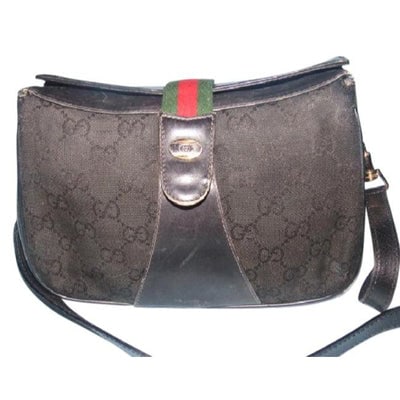 Gucci Guccissima Print Black Crossbody Shoulder Bag Leather Coated Canvas Top Flap Snap: For sale is a Gucci, black, large G logo canvas & leather, multi-compartment, cross body / shoulder bag with red/green GG flap snap closure! This is a unique, rare piece from Gucci that will be th