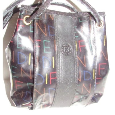 Fendi SAS multi-colored logo on black leather mini backpack/bucket: For sale is an early Fendi SAS, multi-colored 'FENDI' logo print on black coated canvas and black leather, two-way- mini backpack/bucket bag or cross body with 'FENDI' written throughout in red, aqua,