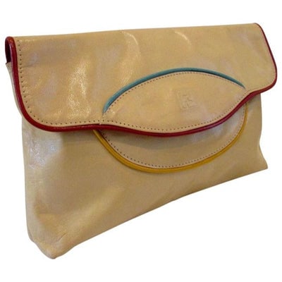 Fendi SAS, mod, ivory patent leather, 2way- cross body/clutch w colorful trim: For sale is a vintage, Fendi, mod look, ivory lacquered/ patent leather, two-way- cross body/shoulder purse or clutch with red, yellow, and blue trim, an envelope top, and embossed FF logo! A gorgeous