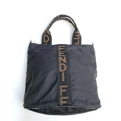 Fendi Bag: For sale is a Fendi, black canvas two-way top handle tote bag or hand held satchel style purse or cross body with two handles, a removable shoulder strap, the Fendi logo down the center in brown and t