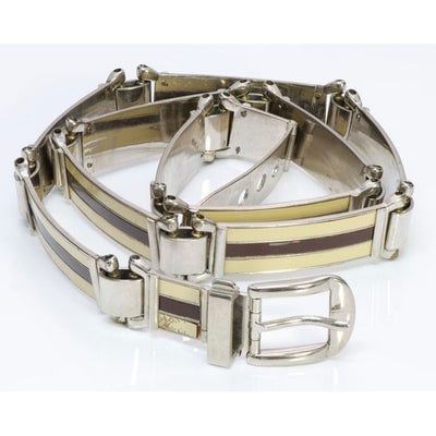 Gucci Sylvie chrome w ivory & red enamel stripes skinny belt: For sale is a vintage, Gucci Sylvie style chrome link with ivory & red enamel stripes skinny belt with metal 'belt buckle' clasp! The belt is a unique take on the chain style that is rare and very on