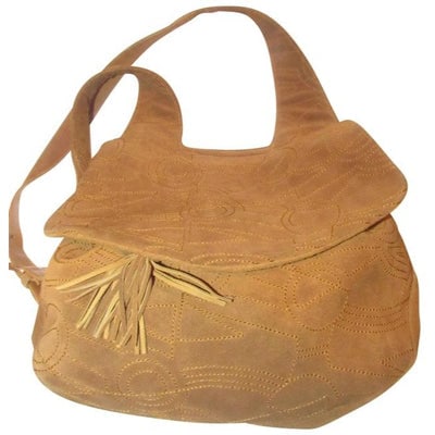 Salvatore Ferragamo Vintage Pursesdesigner Purses Caramel Brown Suede Leather Messenger Bag: STRAIGHT FROM PARIS!! For sale is a vintage, unusual, high end bohemian, Salvatore Ferragamo, camel suede and leather, drawstring top with envelope snap closure, bucket purse with large tassel accents