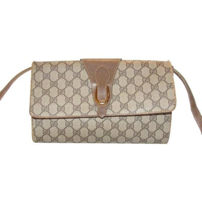 Gucci Horsebit Vintage Accessory Collection Two Way Brown Gg Canvas Bag: For sale is a Gucci, brown large G logo print coated canvas and brown leather two-way style- cross body, shoulder bag, or clutch with an envelope top, gold tone equestrian accents, and a removable str