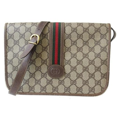 Gucci W Guccissima Sherry Stripe Brown G Print Red Green Leather Coated Canvas Messenger: For sale is a vintage, Gucci, brown Guccissima print coated canvas and brown leather, messenger style, cross body or shoulder bag with a red and green leather stripe, engraved gold hardware, and a lon